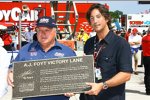 A.J. Foyt (links)