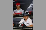 Jarno Trulli (Toyota) und Robert Kubica (BMW Sauber F1 Team) 