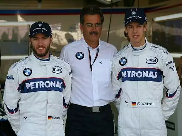 Titel-Bild zur News: Nick Heidfeld, Mario Theissen und Sebastian Vettel