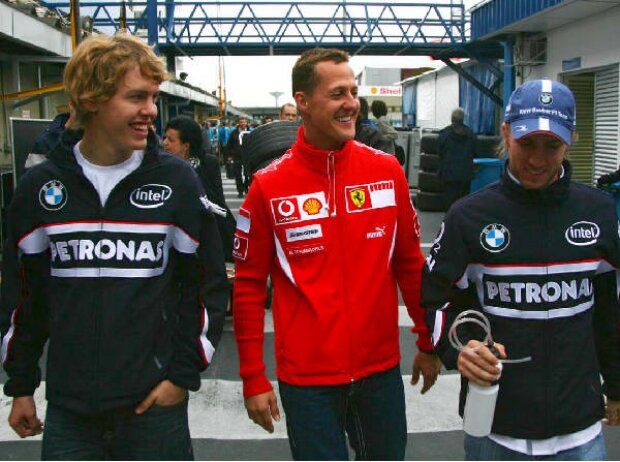 Sebastian Vettel, Michael Schumacher und Nick Heidfeld
