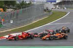 Felipe Massa (Ferrari), Fernando Alonso (McLaren-Mercedes) und Markus Winkelhock (Spyker) 