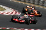 Lewis Hamilton (McLaren-Mercedes) und Adrian Sutil (Spyker) 