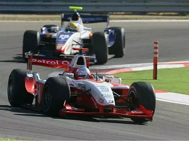 Adam Carroll vor Giorgio Pantano Titel-Bild zur News: Adam Carroll vor Giorgio Pantano