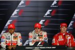 Lewis Hamilton, Fernando Alonso (McLaren-Mercedes) und Kimi Räikkönen (Ferrari)