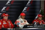 Kimi Räikkönen (Ferrari), Lewis Hamilton (McLaren-Mercedes) und Felipe Massa (Ferrari) 
