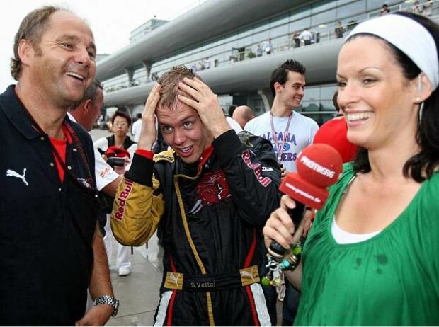 Titel-Bild zur News: Gerhard Berger, Sebastian Vettel und Tanja Bauer