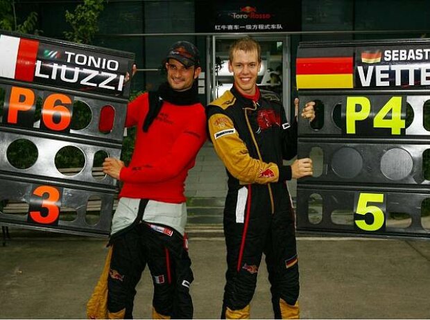 Titel-Bild zur News: Vitantonio Liuzzi und Sebastian Vettel