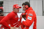 Kimi Räikkönen und Chris Dyer (Ferrari) 