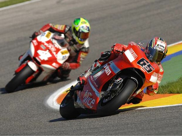 Loris Capirossi vor Alex Barros Loris Capirossi vor Alex Barros