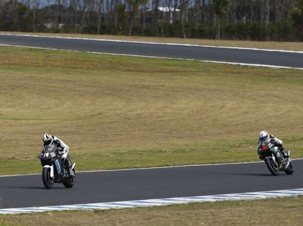 Randy de Puniet vor Andrea Dovizioso Randy de Puniet vor Andrea Dovizioso
