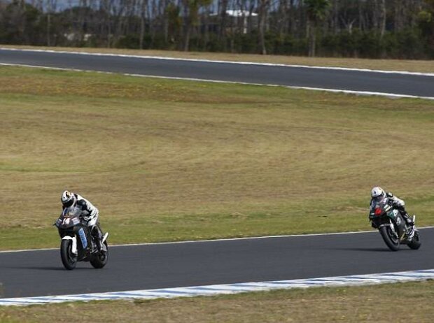 Randy de Puniet vor Andrea Dovizioso