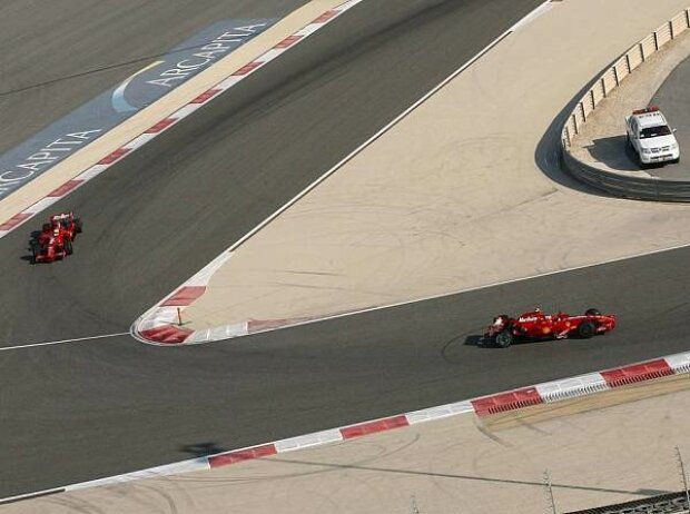 Titel-Bild zur News: Kimi Räikkönen und Luca Badoer