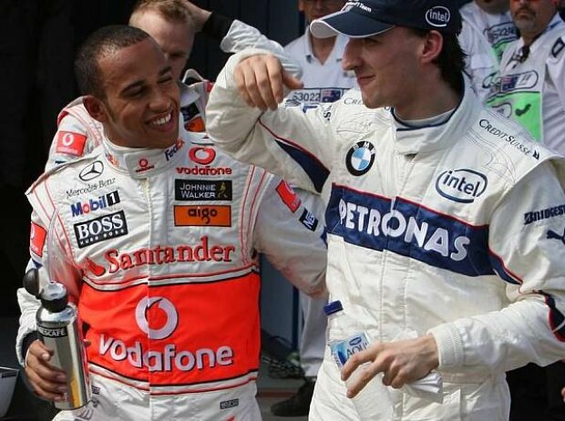 Titel-Bild zur News: Lewis Hamilton und Robert Kubica