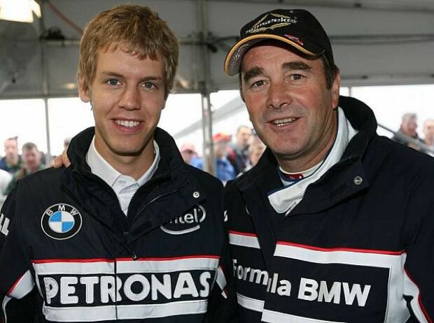 Titel-Bild zur News: Sebastian Vettel mit Nigel Mansell