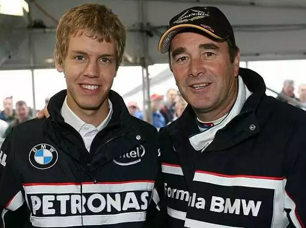 Sebastian Vettel mit Nigel Mansell Titel-Bild zur News: Sebastian Vettel mit Nigel Mansell