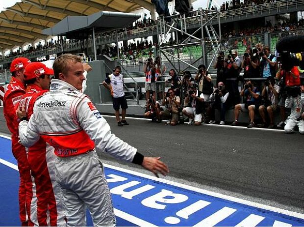 Titel-Bild zur News: Heikki Kovalainen, Felipe Massa und Kimi Räikkönen