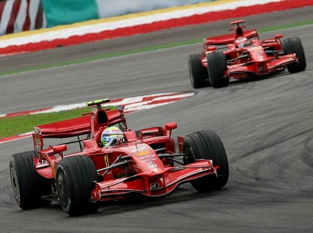 Titel-Bild zur News: Felipe Massa; Kimi Räikkönen
