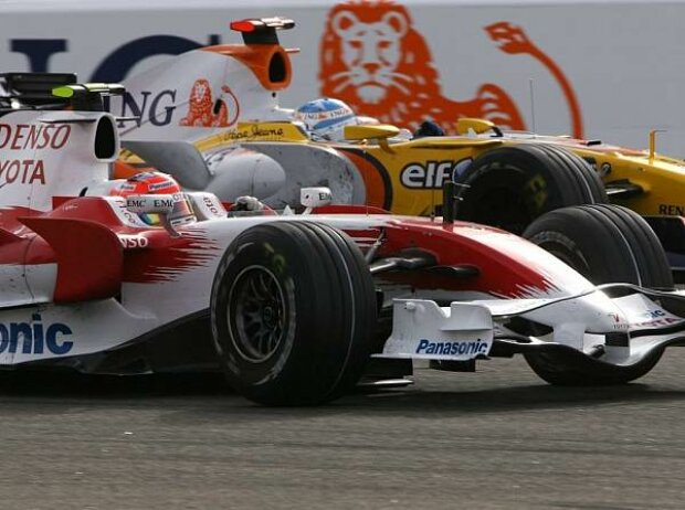 Titel-Bild zur News: Timo Glock und Fernando Alonso