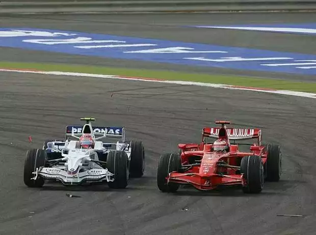 Titel-Bild zur News: Robert Kubica und Kimi Räikkönen