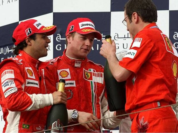 Titel-Bild zur News: Felipe Massa, Kimi Räikkönen und Stefano Domenicali