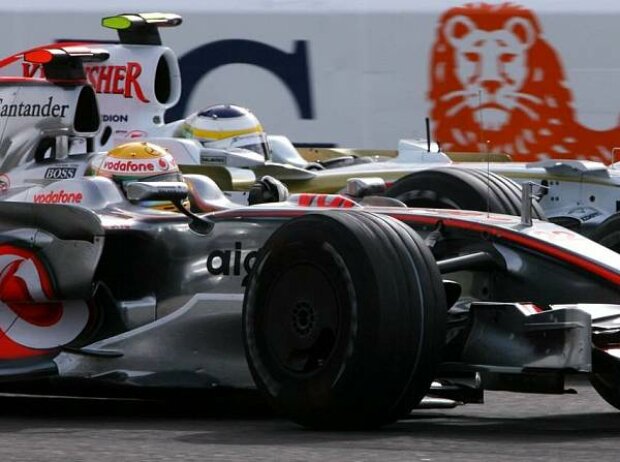 Titel-Bild zur News: Lewis Hamilton; Giancarlos Fisichella