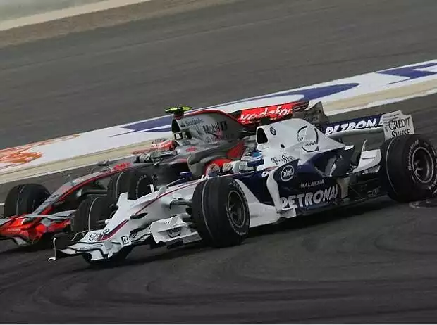 Nick Heidfeld und Heikki Kovalainen Titel-Bild zur News: Nick Heidfeld und Heikki Kovalainen