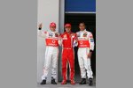 Heikki Kovalainen (McLaren-Mercedes), Felipe Massa (Ferrari) und Lewis Hamilton (McLaren-Mercedes)