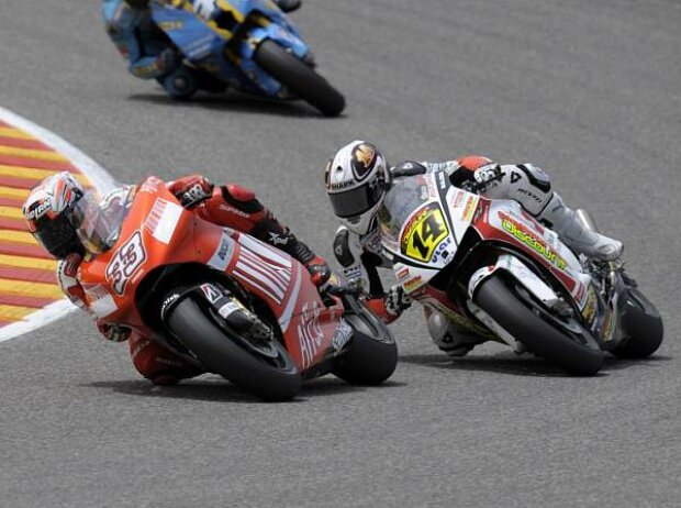Marco Melandri vor Randy de Puniet Marco Melandri vor Randy de Puniet