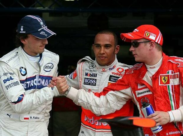 Titel-Bild zur News: Robert Kubica, Lewis Hamilton und Kimi Räikkönen