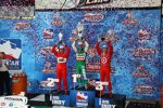 Tony Kanaan, Helio Castroneves und Scott Dixon feiern auf dem Podium