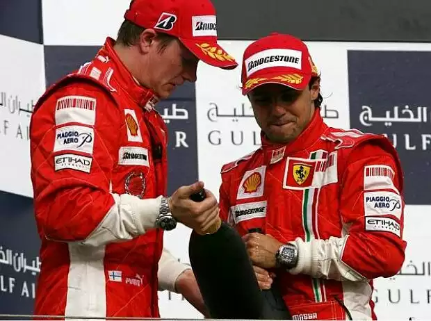 Titel-Bild zur News: Kimi Räikkönen und Felipe Massa