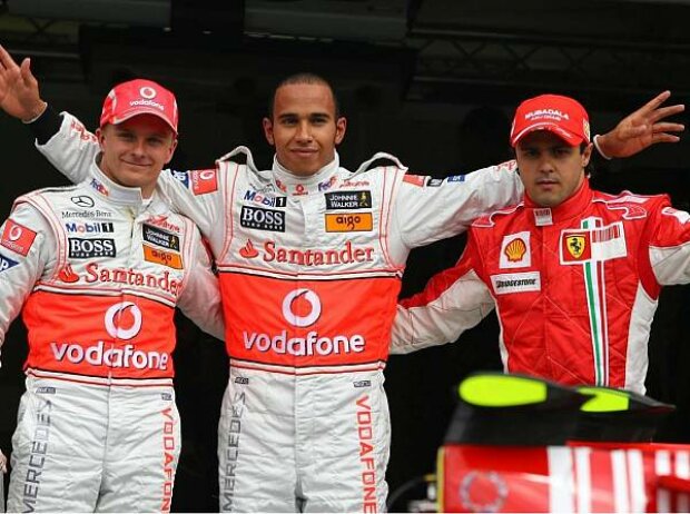 Titel-Bild zur News: Heikki Kovalainen, Lewis Hamilton und Felipe Massa