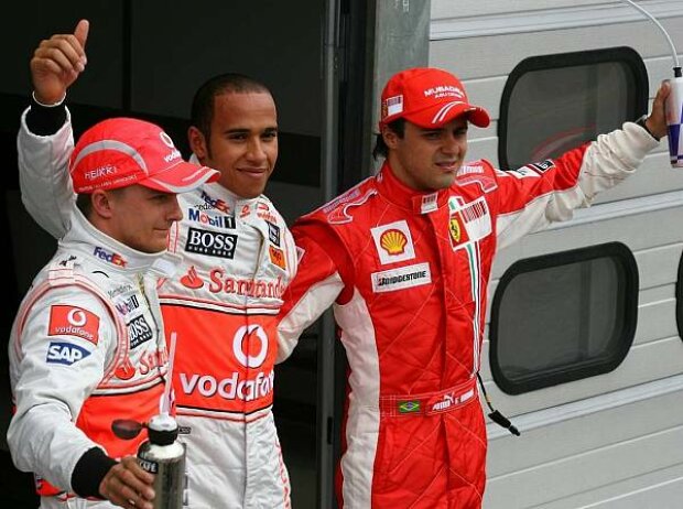 Titel-Bild zur News: Heikki Kovalainen, Lewis Hamilton und Felipe Massa