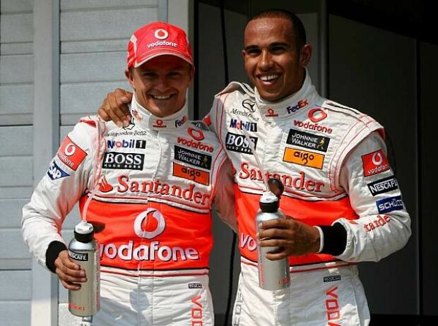 Titel-Bild zur News: Heikki Kovalainen; Lewis Hamilton