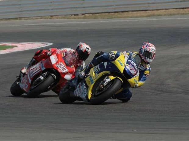 Colin Edwards vor Marco Melandri Colin Edwards vor Marco Melandri