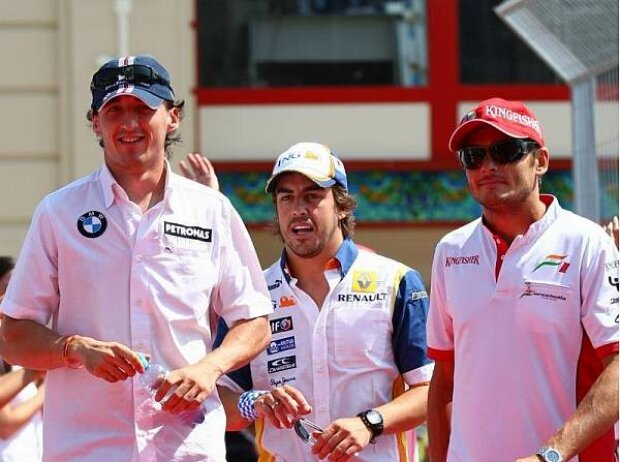 Titel-Bild zur News: Robert Kubica, Fernando Alonso und Robert Kubica