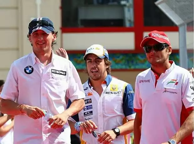 Robert Kubica, Fernando Alonso und Robert Kubica Titel-Bild zur News: Robert Kubica, Fernando Alonso und Robert Kubica