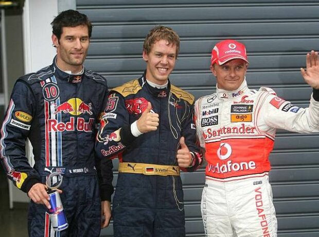 Titel-Bild zur News: Mark Webber, Sebastian Vettel und Heikki Kovalainen