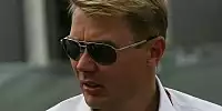 Bild zum Inhalt: Häkkinen und die zwei Sieger in Singapur