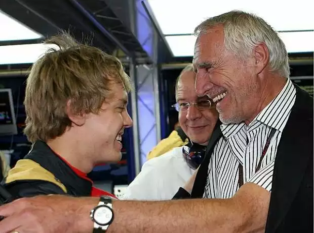 Titel-Bild zur News: Sebastian Vettel, Burghard Hummel und Dietrich Mateschitz