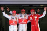 Heikki Kovalainen, Lewis Hamilton (McLaren-Mercedes) und Kimi Räikkönen (Ferrari)  