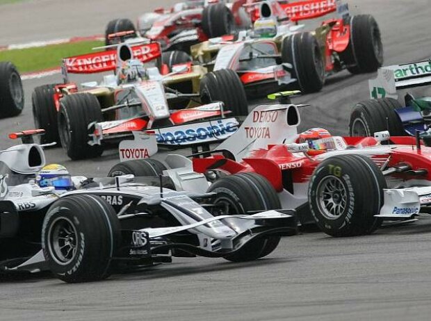 Nico Rosberg Timo Glock Nico Rosberg Timo Glock