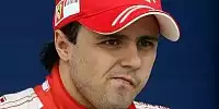 Bild zum Inhalt: Massa und Hamilton: Emotionen und Blumen