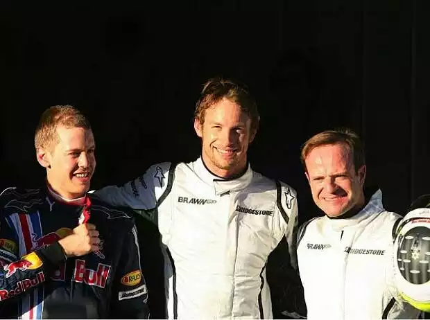 Titel-Bild zur News: Sebastian Vettel und Jenson Button und Rubens Barrichello