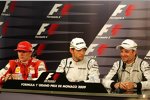 Kimi Räikkönen (Ferrari), Jenson Button und Rubens Barrichello (Brawn) 