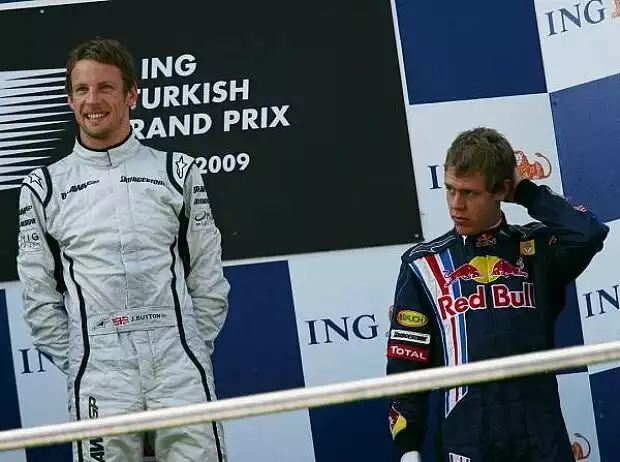 Jenson Button und Sebastian Vettel Titel-Bild zur News: Jenson Button und Sebastian Vettel