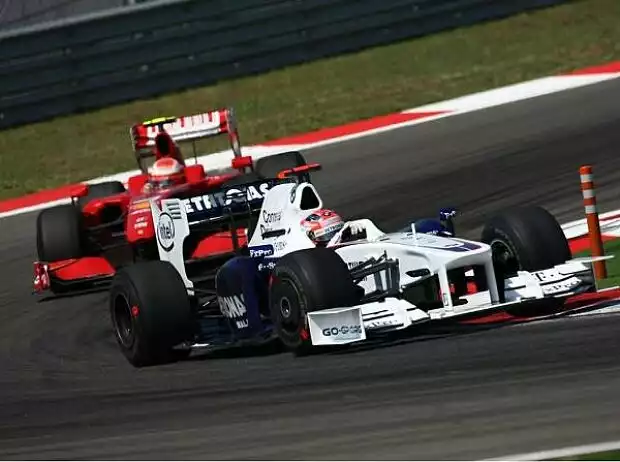 Titel-Bild zur News: Kimi Räikkönen, Robert Kubica