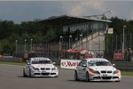 Andy Priaulx, Jörg Müller (BMW Team Germany) (BMW Team UK) 