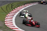 Felipe Massa (Ferrari) und Rubens Barrichello (Brawn) 