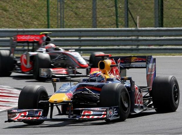 Titel-Bild zur News: Heikki Kovalainen, Mark Webber
